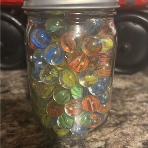 Colorful Glass Marbles in Jar
